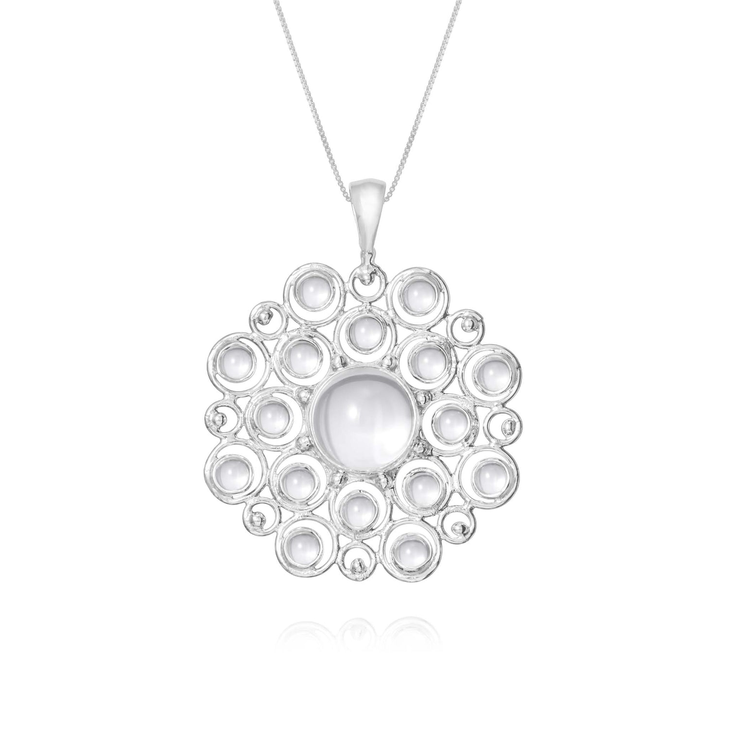 The Purity Pendant by Kaora Sandara Jewelry is a delicate sterling silver 925 necklace, featuring a circular pendant composed of interconnected smaller circles. At the center of the pendant is a larger, polished, transparent rhinestone crystal that gives the piece a sophisticated and elegant appearance.