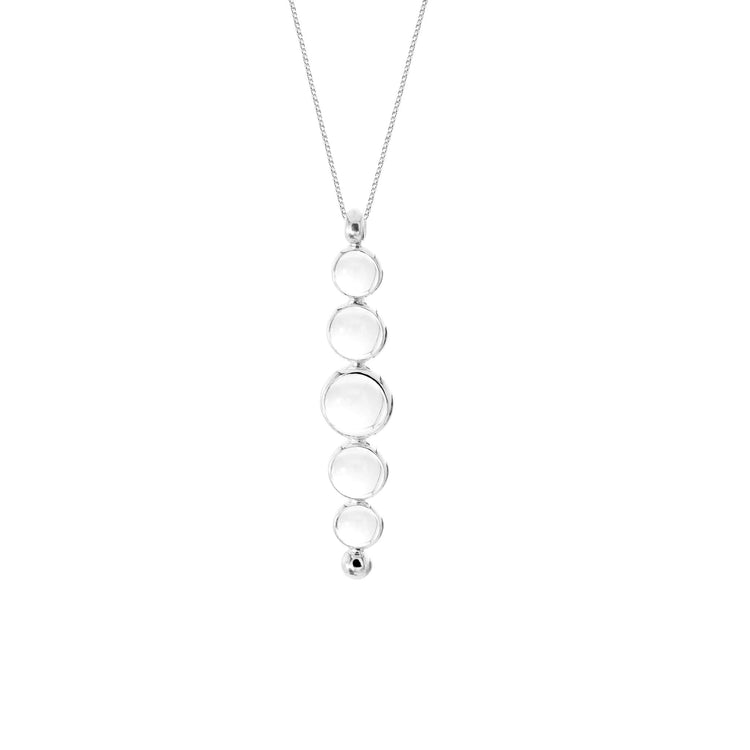 Introducing the Harmony Pendant by Kaora Sandara Jewelry: a stylish sterling silver 925 necklace featuring a sleek, vertical pendant adorned with five round, graduated discs arranged in a line. The discs elegantly increase in size from top to bottom, creating a minimalist design beautifully set against a white background.