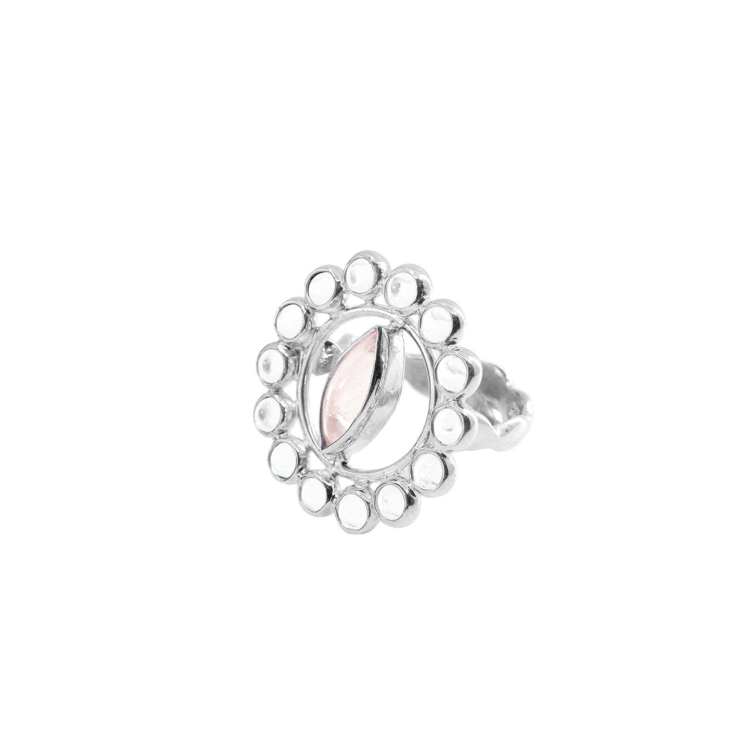 The Anima Ring from Kaora Sandara Jewelry features sterling silver adorned with a central marquise-shaped crystal, encircled by a delicate pattern of smaller round rose quartz stones. The intricate design imparts a charming vintage or antique appearance.