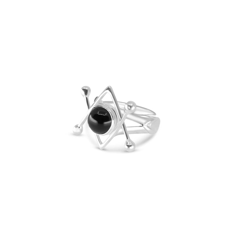 The Energy Protection Ring from Kaora Sandara Jewelry showcases a stunning sterling silver 925 construction with a geometric design that includes small silver balls. At its center is a captivating black agate stone, blending modern artistry with energy protection for an alluring look.