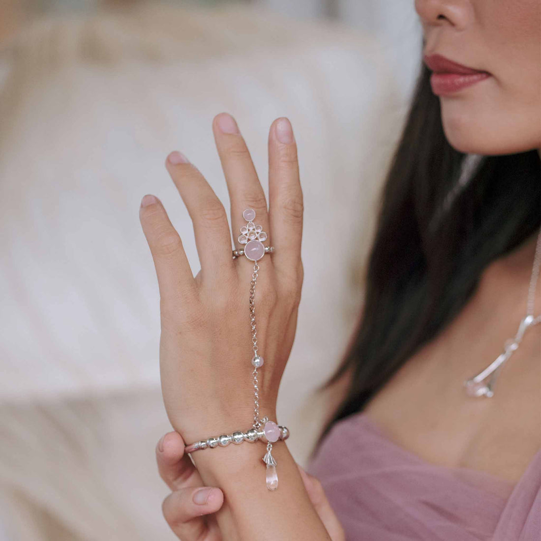 Elegant 'Infinite Gratitude' Sterling Silver Hand Chain adorned with Solid Crystal and Rose Quartz Sphere Gemstones. Embrace the Power of Gratitude