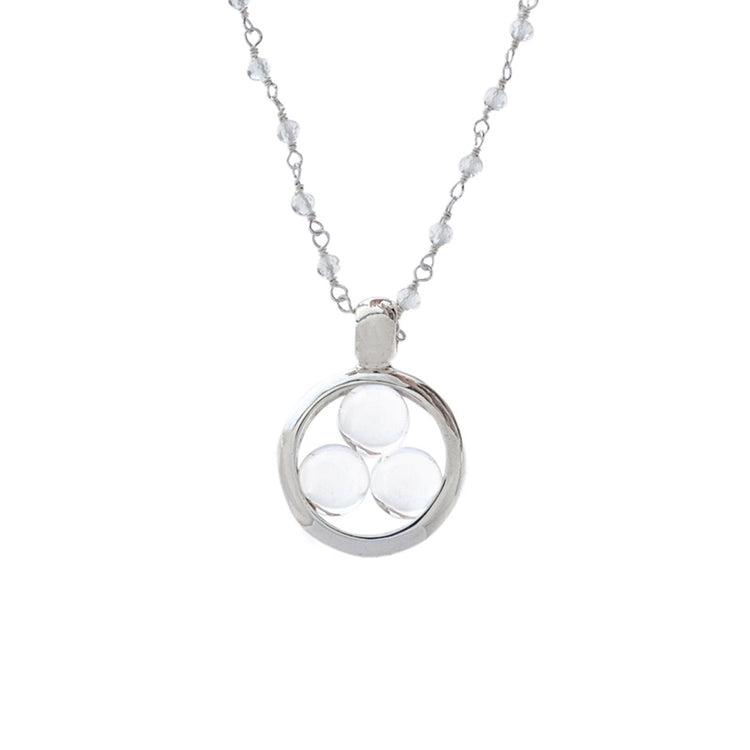 The Kaora Sandara Jewelry Silver Pendant Crystal Peace necklace features three crystal sphere gemstones, including a rock crystal, in a circular setting. The silver-crystal chain includes small beads for a minimalist and elegant design that harmonizes your energy field.