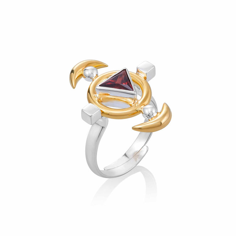 The Resource Ring by Kaora Sandara Jewelry features a sterling silver 925 band adorned with a gold-plated circular design and a vivid red triangular gemstone, evocative of a garnet. Its intricate geometric accents harmonize smooth and angular elements, channeling life energy into its captivating form.