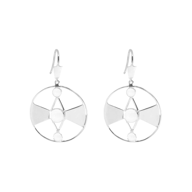 Kaora Sandara Jewelry presents the Honesty Earhooks, a pair of sterling silver 925 earrings showcasing circular geometric designs with a central white stone and three smaller transparent rhinestone crystals on the inner circumference. These elegant earrings dangle from simple hooks and are said to enhance psychic abilities.