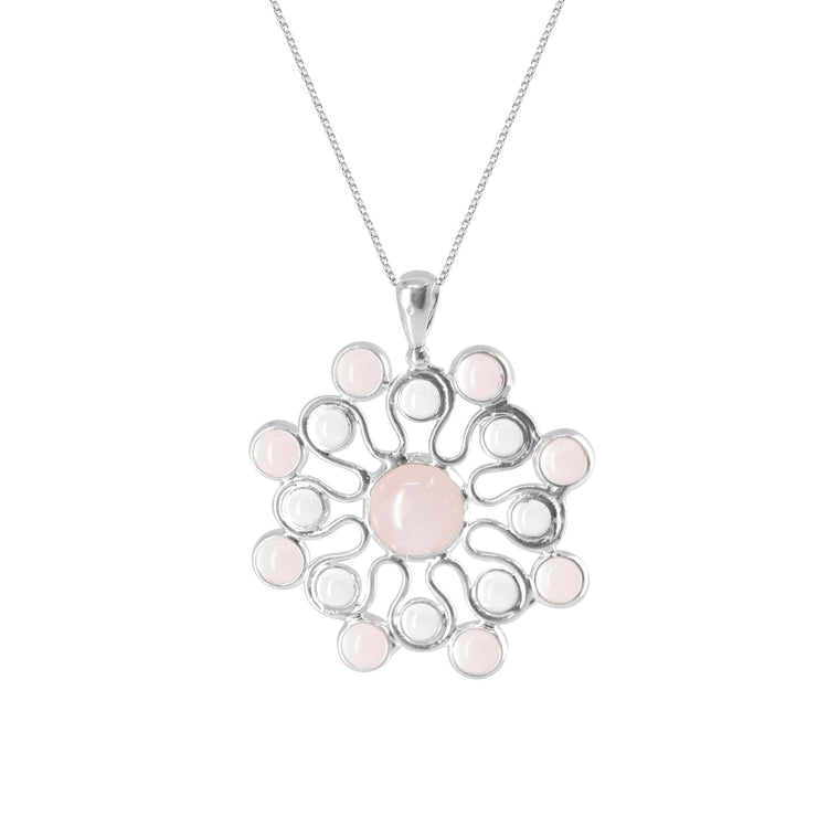 A Source of Love Pendant from Kaora Sandara Jewelry, this sterling silver necklace features an exquisite circular design with a central light pink crystal surrounded by smaller crystals arranged in a radiant pattern. Crafted from Rose Quartz Sterling Silver, the intricate openwork pendant hangs elegantly from a delicate chain, radiating high positive vibrations.