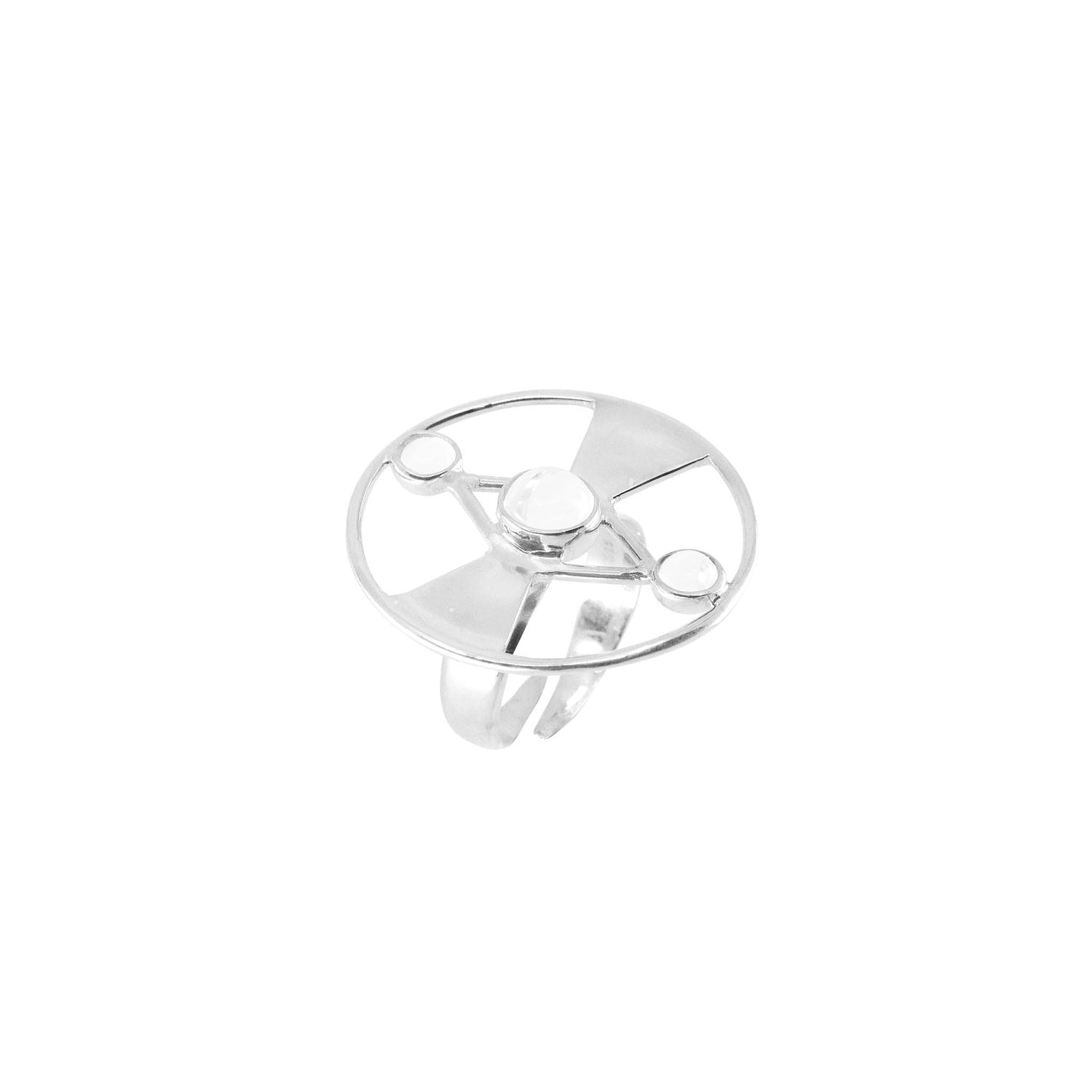 The Honesty Ring by Kaora Sandara Jewelry features a minimalist design in sterling silver, characterized by a large central sphere and three smaller spheres interconnected in a molecular-like structure. Its simple and elegant band is adorned with rhinestone crystals, enhancing its timeless charm.